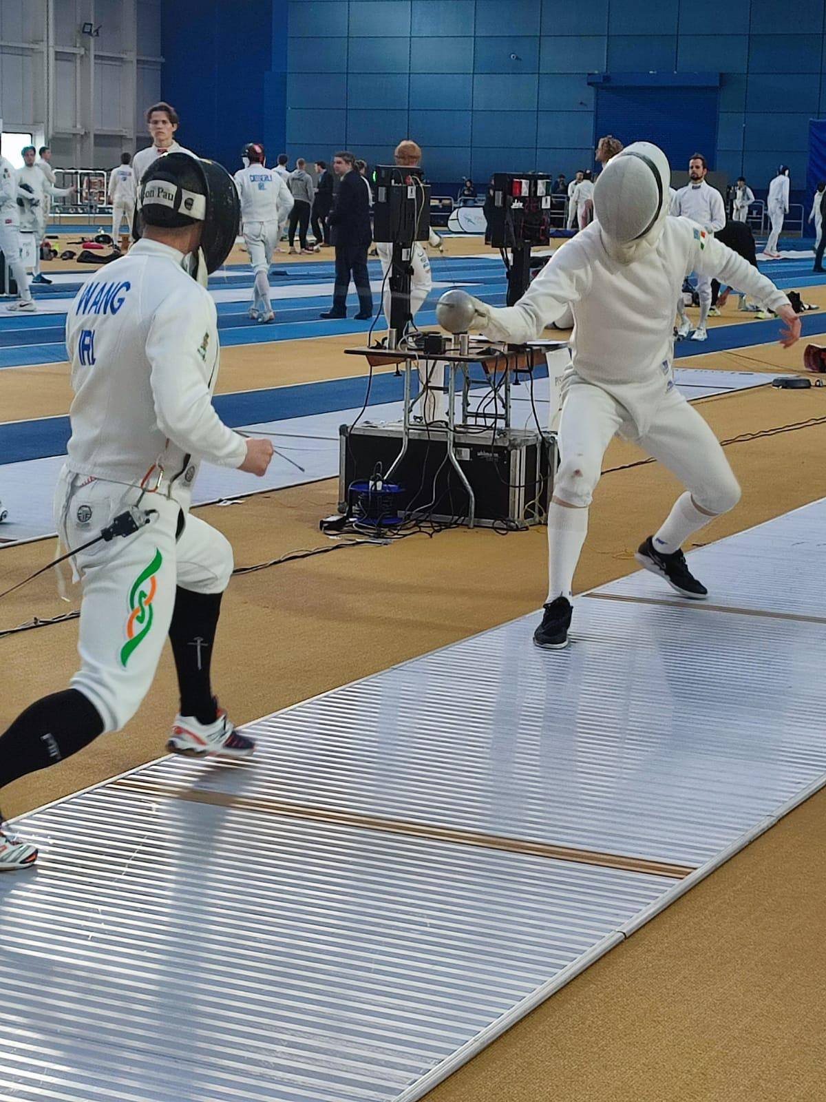 Fencing competition action